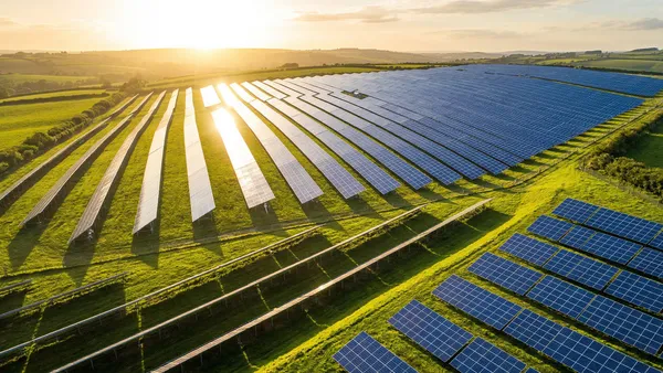 Drone inspecting solar farm panels with thermal camera