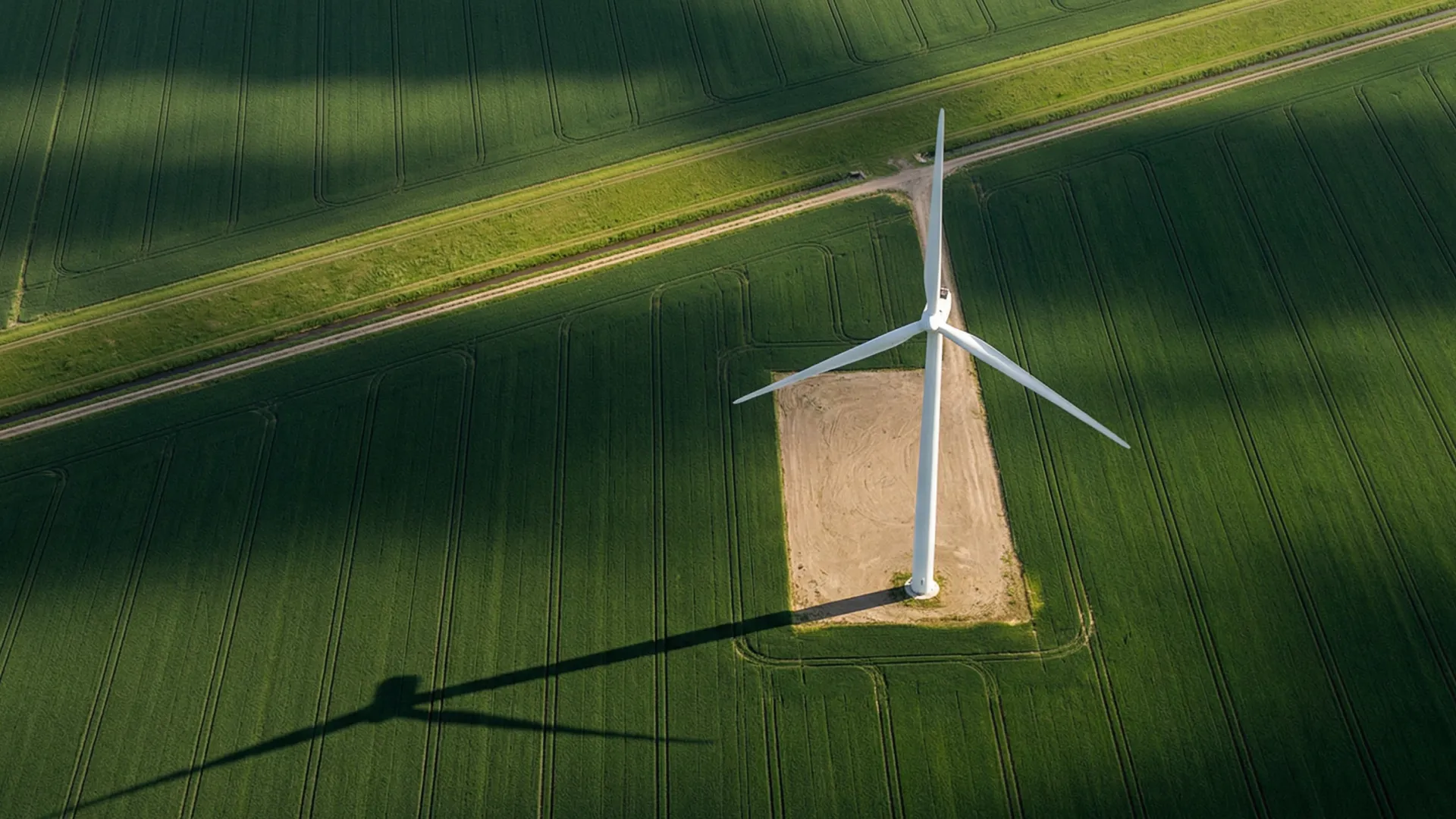 Aerial view of wind turbine inspection with drone