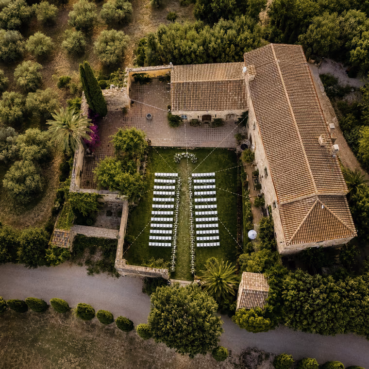 Top-down drone view of a wedding venue before the ceremony